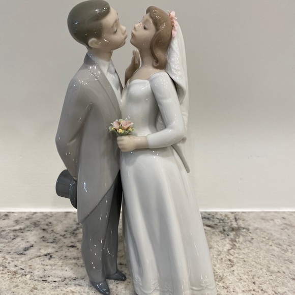 Bride & groom a kiss to remember lladro